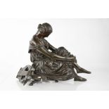 A fine 19th century French patinated bronze sculpture, signed J Pradier, study of the seated poet