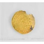 A Middle Eastern Saljouq gold coin, approximately 1109 A.D., for Abu El Harith Sandar Mahmoud Bin