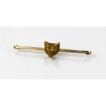 An antique 9ct gold "Fox head" bar brooch, 3.8g