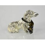 A silver plated model Daschund, 4cm high.