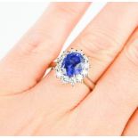 A platinum blue sapphire and diamond ring, the sapphire approx 3.15ct, the diamond approx 0.7ct,