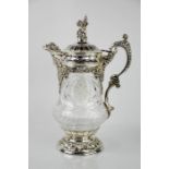 A fine silver and cut glass Portuguese claret jug, marked 925, the profusely decorated etched body