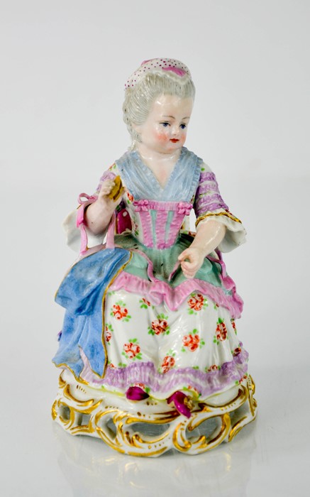 A Meissen porcelain figure of a seated lady holding a clam shell, together with a Sitzendorf - Image 4 of 7