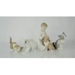 A Lladro puppy & boy, a polar bear and two cats.