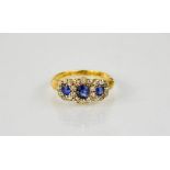 An antique 18ct yellow gold, sapphire and diamond ring, dated 1898, size Q, 4.6g.