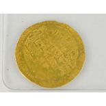 A Middle Eastern Dinar Abbassi Empire gold coin, approximately 770 AD, for Amar Amin, with
