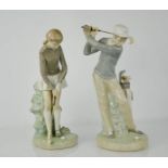 A pair of Lladro porcelain golfing figurines.