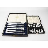 A boxed set of Sterling silver teaspoons together with a set of silver handled knives