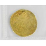 A Middle Eastern Salajiqah gold coin, approximately 1079 A.D. for Saif-ul-Dein Mohammed Al Mustanjid