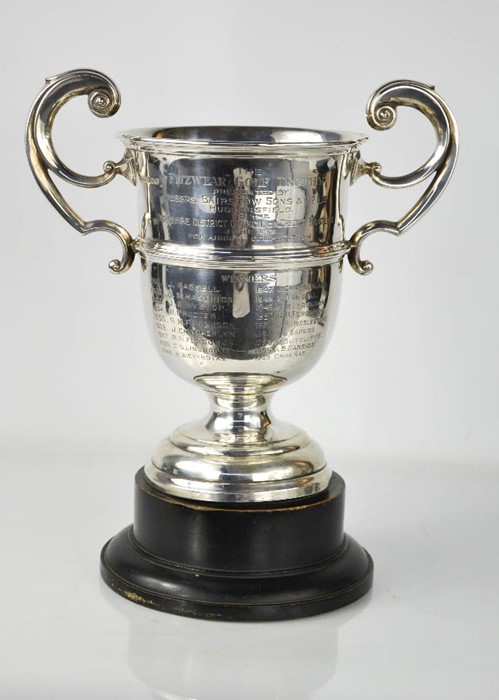 A silver trophy bearing presentation inscription, Sheffield 1929, James Dixon & Sons, raised on a