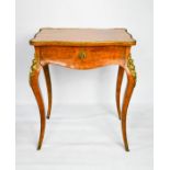 A 19th century French burr walnut rectangular scallop shaped table with gilt metal mounts, with