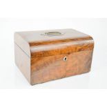 A Victorian walnut domed sewing box with initials BGEG to the top.