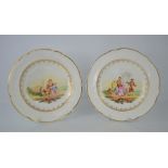 Two 19th century hand painted plates depicting figural scenes - 20.5cm