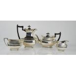 A silver tea service comprising tea pot, hot water pot, sugar bowl and milk jug, Sheffield 1964,