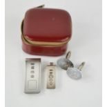 A silver card clip, silver ingot and a pair of silver cufflinks, 1.28toz.