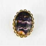 A gold plated blue John brooch