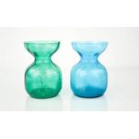 Two glass hand blown Hyacinth jars, one in blue, the other green.