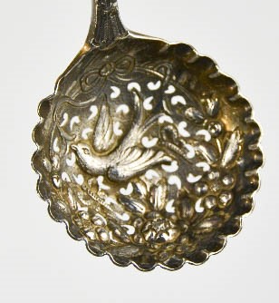 A silver sifter spoon, London 1735, the bowl embossed with flowers, and birds. - Image 2 of 3