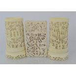 A pair of 19th century Chinese Ivory brush holders together with a ivory card holder carved with