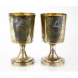 A pair of Georgian silver goblets, engraved with motif, London 1808, 15cm high, 17.96toz.