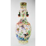 A large Chinese vase, 19th century, painted with exotic flowers, butterflies and animals, with