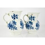 Two 18th century Worcester blue and white jugs, circa 1780, with crescent marks to the base, with