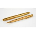 A pair of 9ct gold parker pens, engraved with initials AEI and dated 1908-1958, 51.7g.