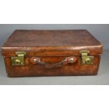 An antique leather suitcase.