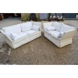 A pair of 20th century Parker Knoll settees, one two seater and one three seater with loose