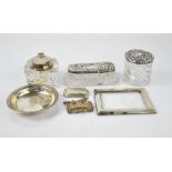 Two silver and glass Victorian dressing table boxes, a silver dish, two silver bottle tags, a