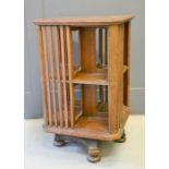 An Edwardian oak revolving bookcase