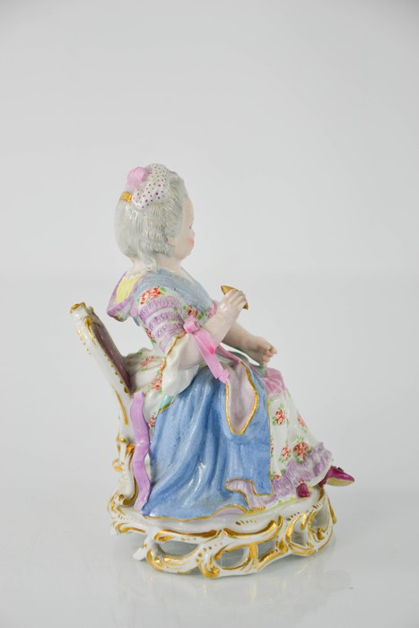 A Meissen porcelain figure of a seated lady holding a clam shell, together with a Sitzendorf - Image 6 of 7