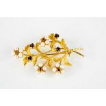 A vintage 9ct gold floral spray brooch, with cultured pearls and garnets, 9g.