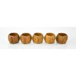 A Robert Thompson 'Mouseman' set of five napkin rings, each bearing trademark carved mouse.