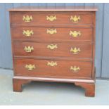 A 19th century Georgian mahogany chest of drawers, raised on bracket feet. A/F.