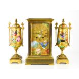 A 19th century brass & porcelain mantle clock garniture, circa 1890, the dial and side panels finely