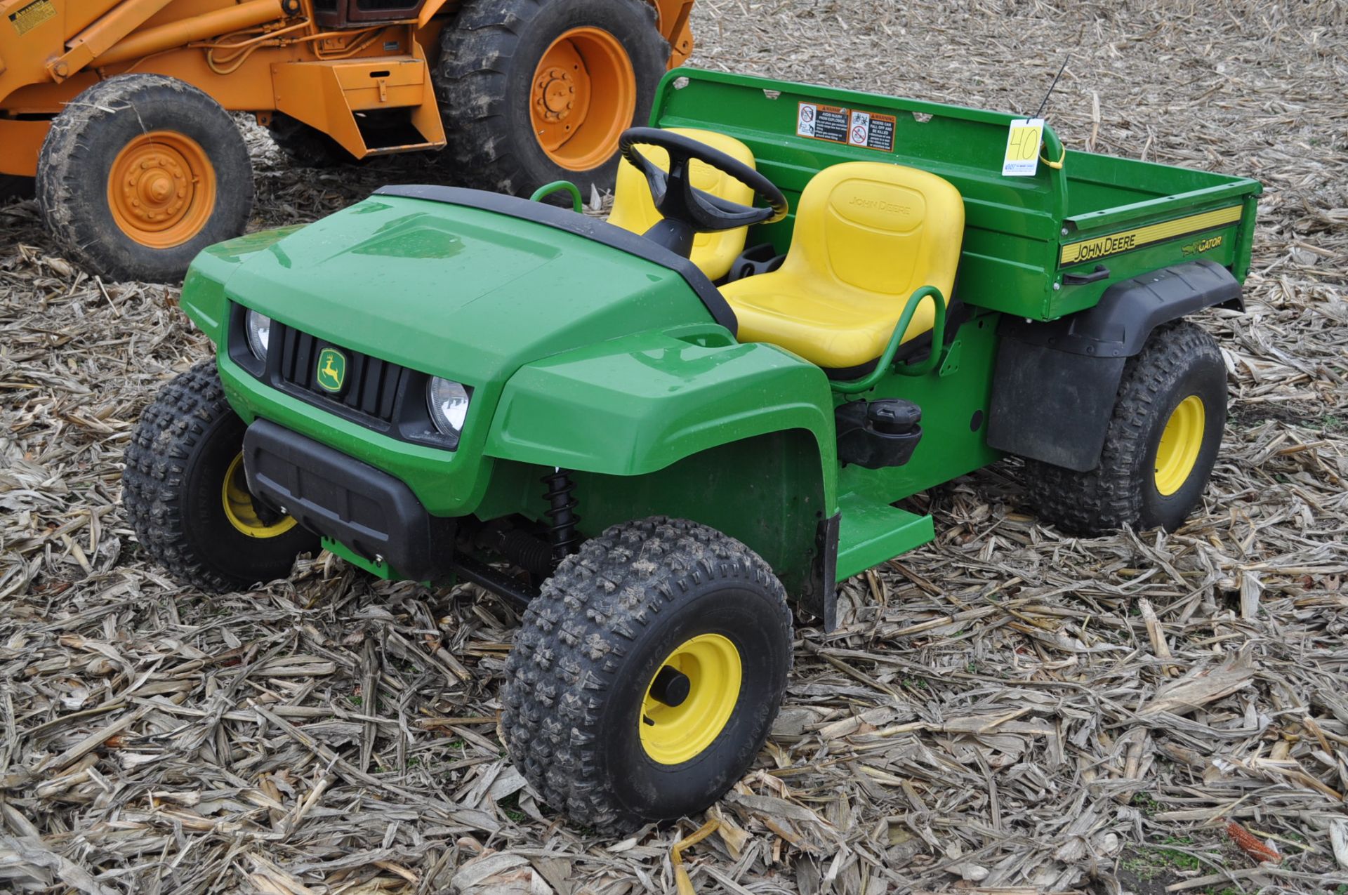 John Deere TS Gator, 4x2, gas, manual dump bed, headlights, 112 hrs, SN 091053