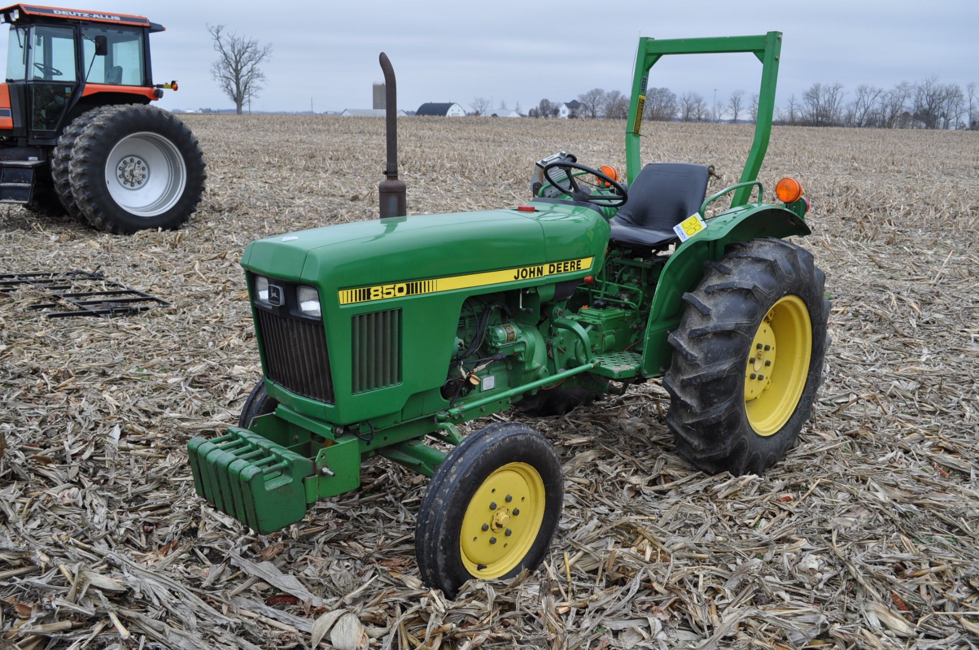 John Deere 850 utility tractor, diesel, 12.4-24 rear, 5.00-16 front, 2 hyd remotes, 3 pt, 540 pto,