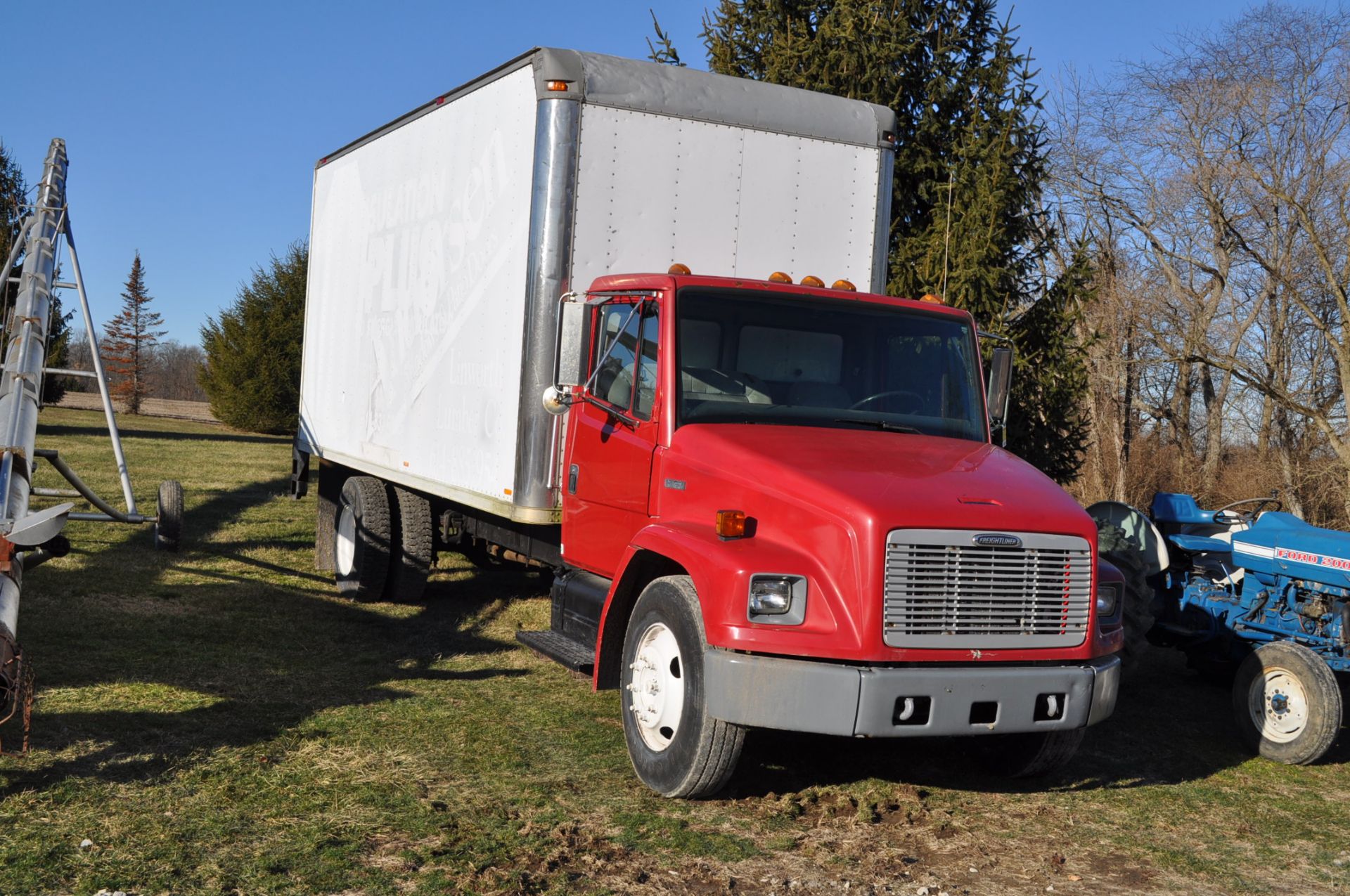 1999 Freightliner FL60 box truck, 20' box with roll up door, single axle, CAT 3126, 5 sp, hyd brake