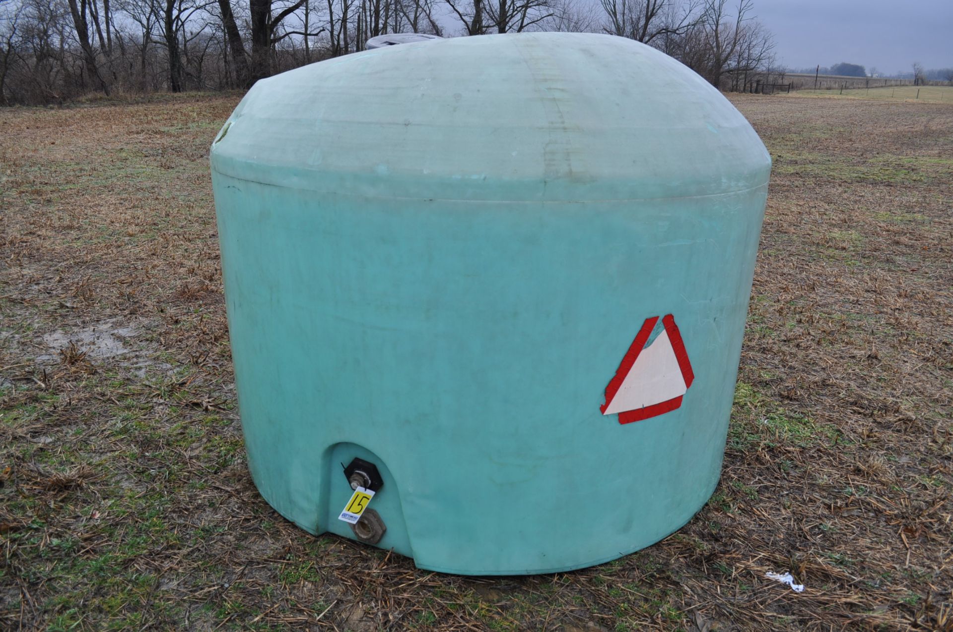 1200 gallon flat bottom poly tank, hole in top