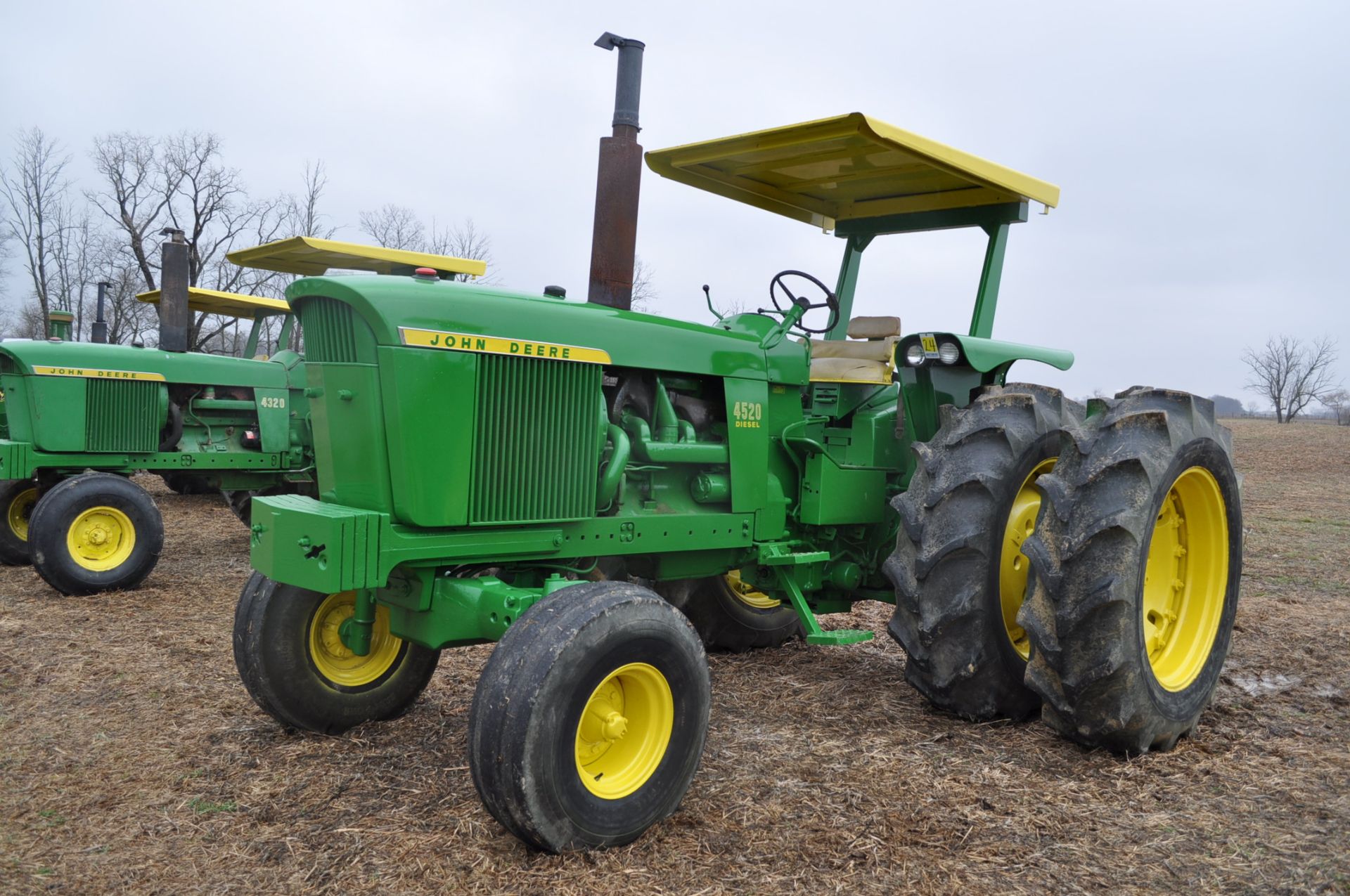 John Deere 4520 tractor, diesel, 18.4-38 rice & cane axle duals, 11.00-16 wide front, ROPS w/