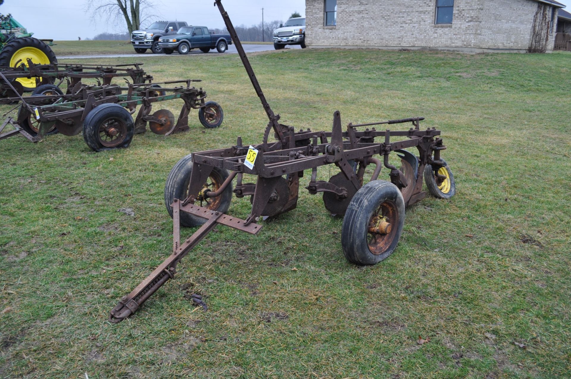 John Deere 3-btm x 16” plow, pull-type