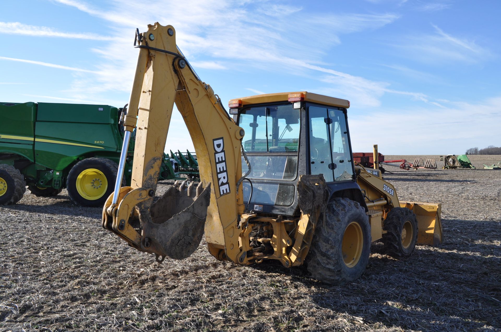 John Deere 310SE Backhoe, 4X4, Cab, heat, rubber and steel outriggers, sells with 24 inch WB Bucket, - Image 3 of 22