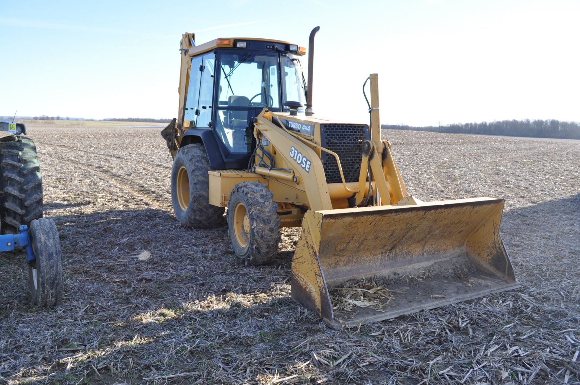 John Deere 310SE Backhoe, 4X4, Cab, heat, rubber and steel outriggers, sells with 24 inch WB Bucket, - Image 4 of 22