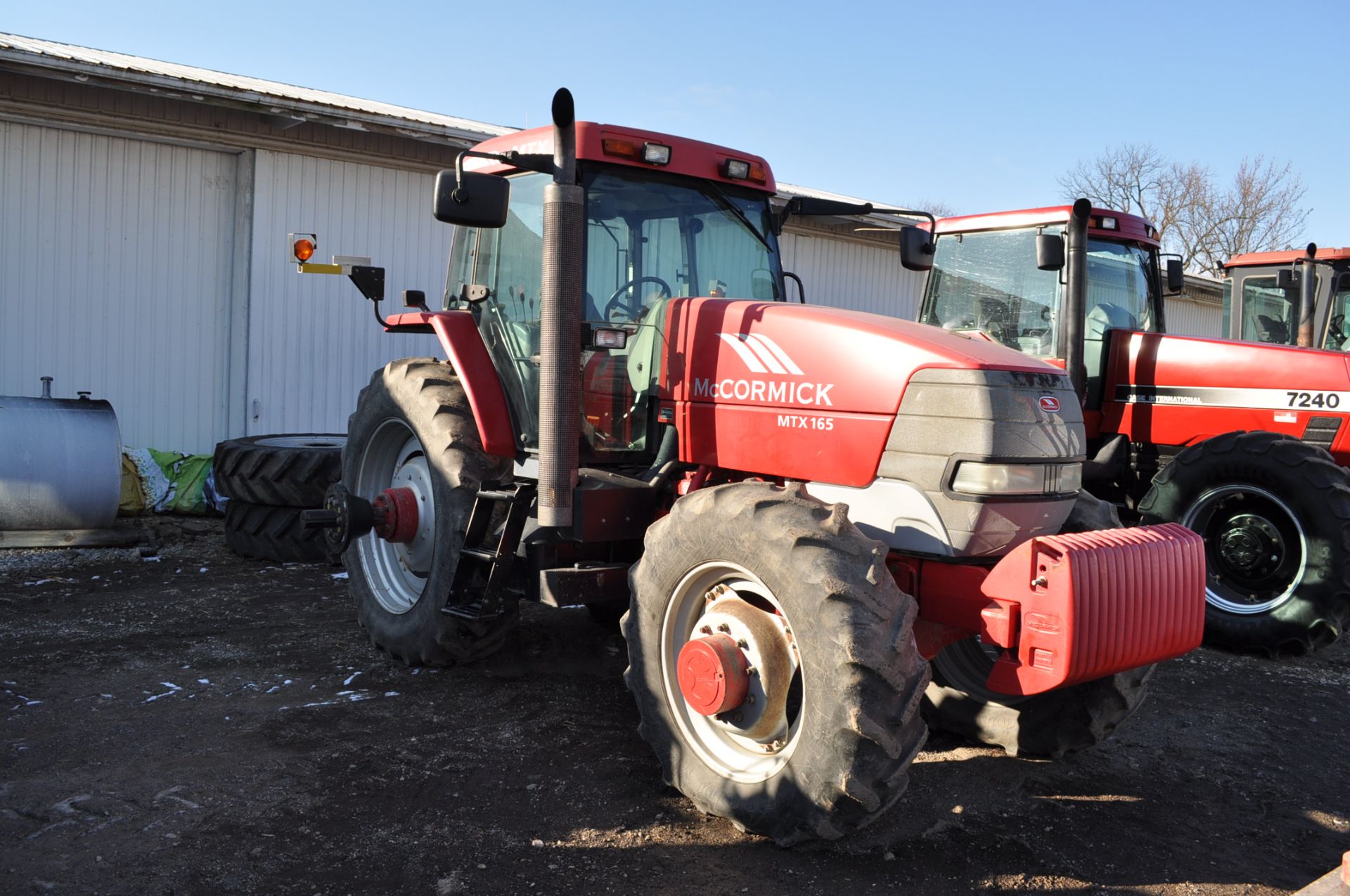 McCormick MTX 165 MFWD tractor, 18.4-42 axle duals, 14.9R30 front, C/H/A, shuttle shift, 16 spd