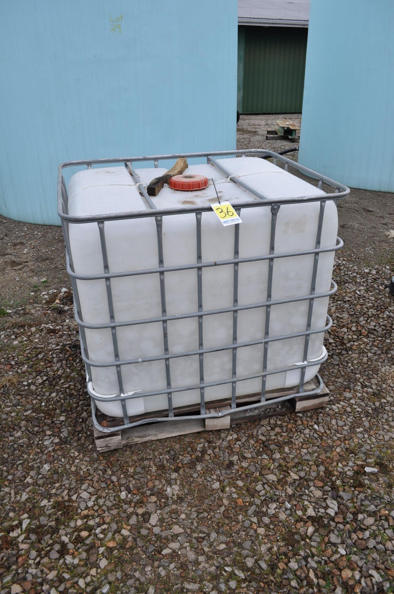 poly chemical tank in cage