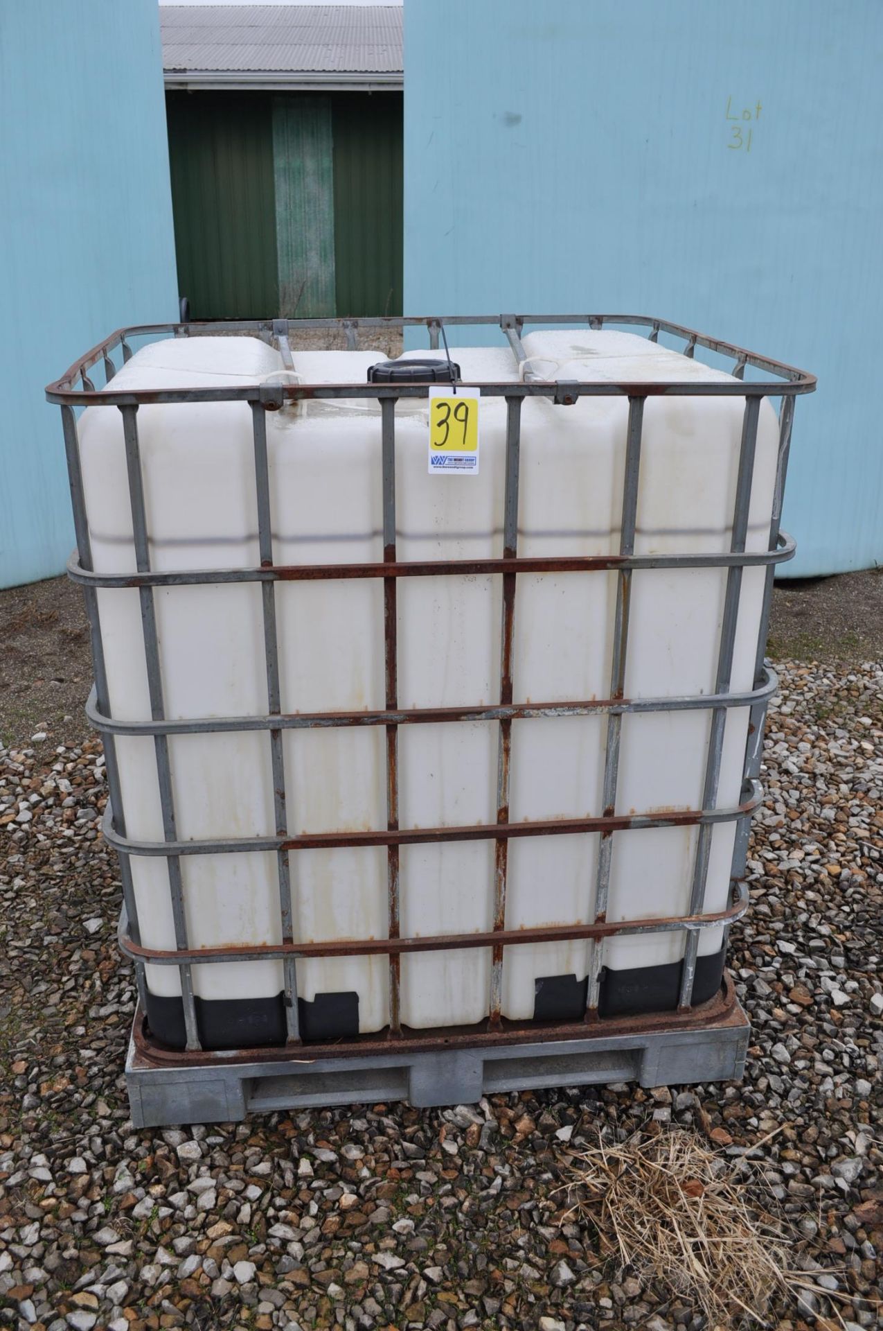 poly chemical tank in cage