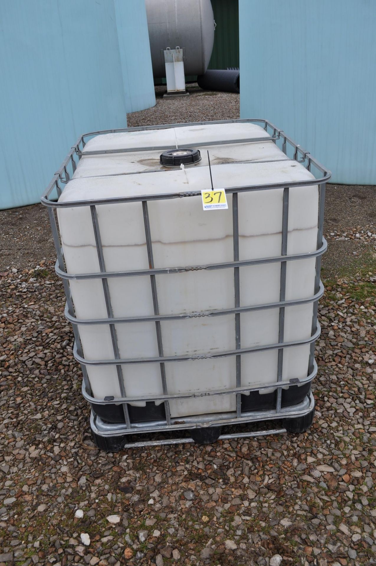 poly chemical tank in cage