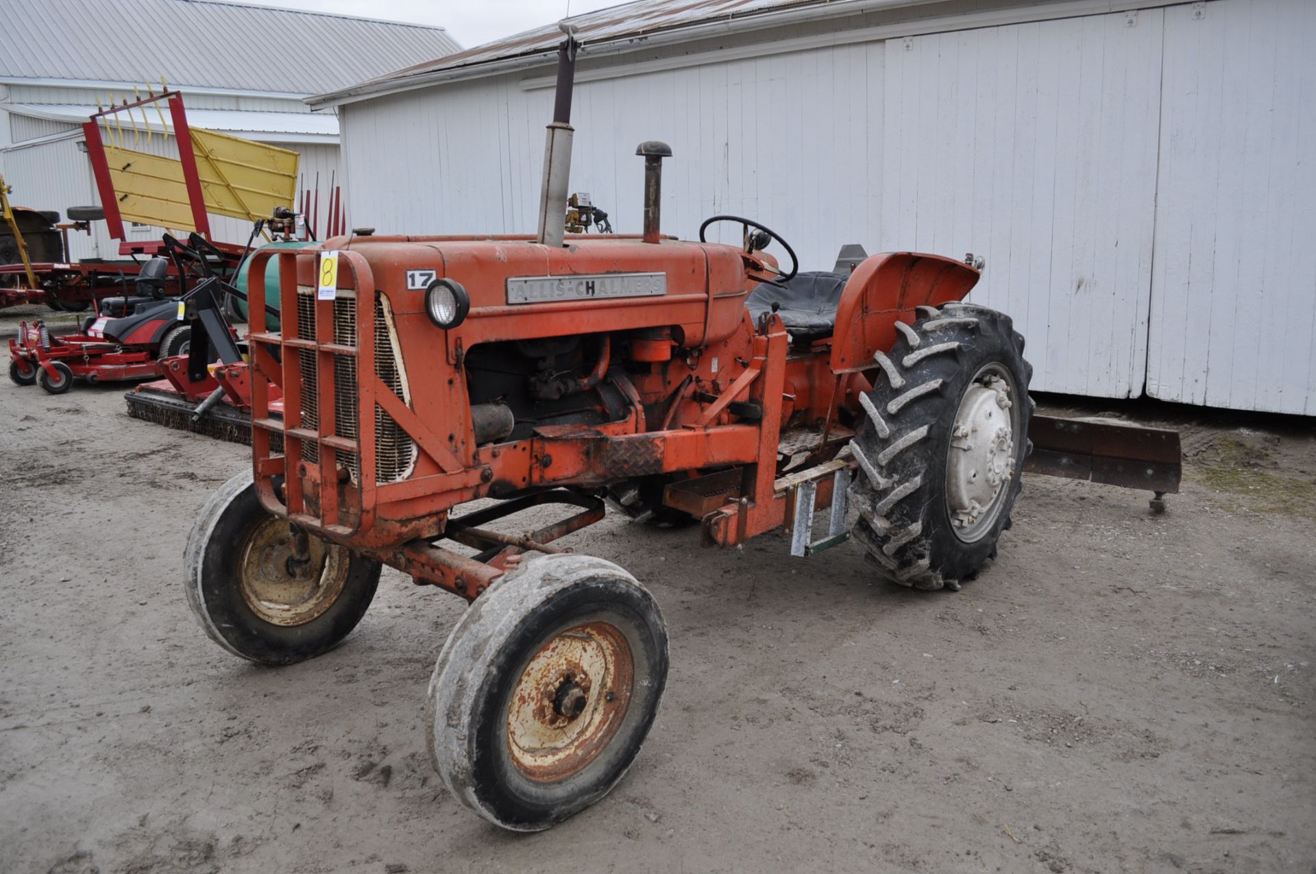 Allis-Chalmers D17 tractor, 12.4R28 rear tires, 540 PTO, snap coupler, sells with 9' blade, no