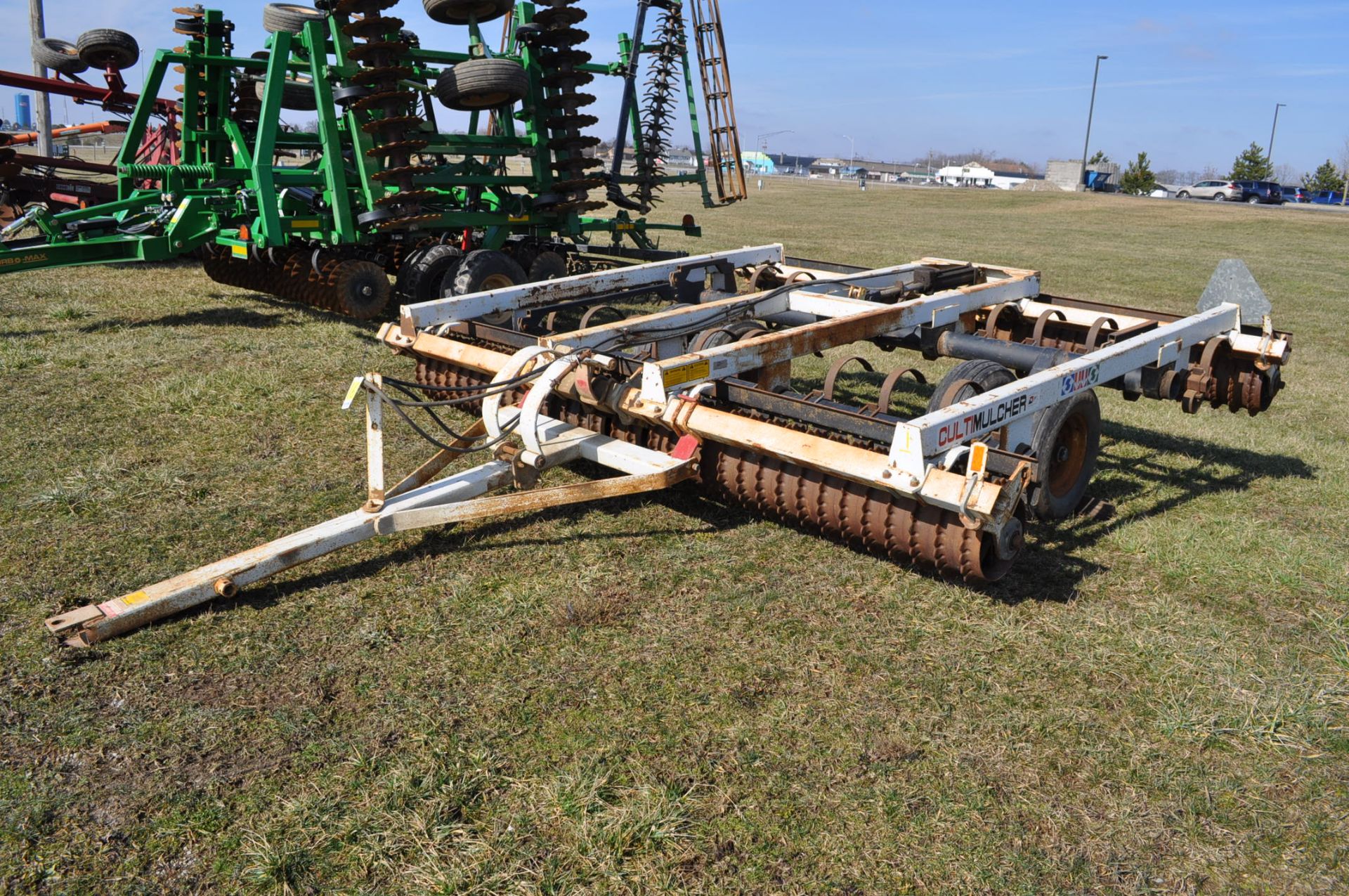 12’ Dunham Lehr cultimulcher, rear hitch, hyd raise